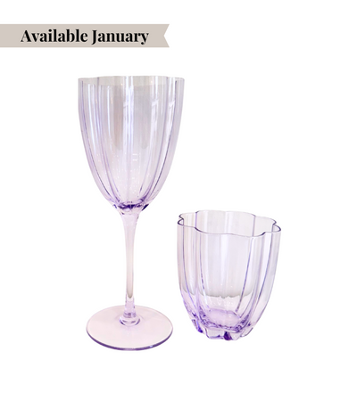 purple glassware with floral shaped rim