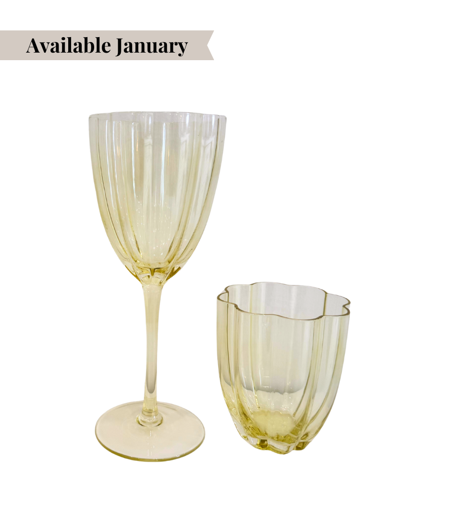 yellow glassware with floral shaped rim