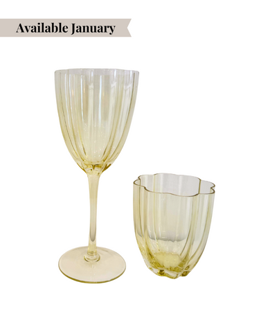 yellow glassware with floral shaped rim