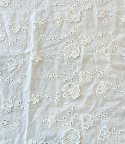 white tablecloth with 3d floral detailing