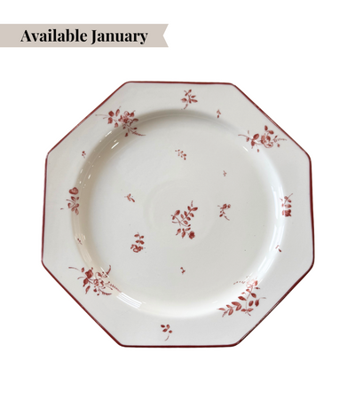 decorative maroon charger plate with unique shape and floral pattern