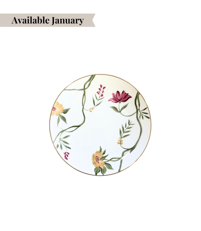 white porcelain bread plate with floral design and gold rim