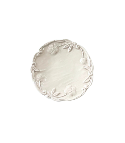 ivory bread plate with embossed floral rim