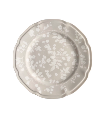 light grey dinner plate with white floral pattern
