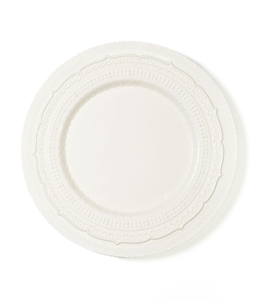 ivory charger plate with lace pattern detailing 