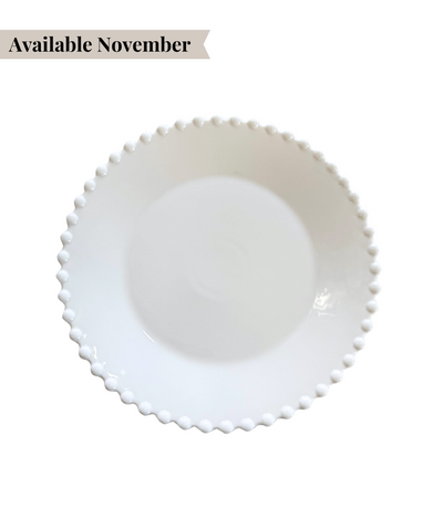white dinner plate with pearl edged pattern