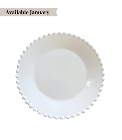 white dinner plate with pearl edged pattern