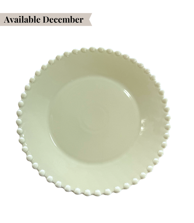 pale green charger plate with pearl edged pattern