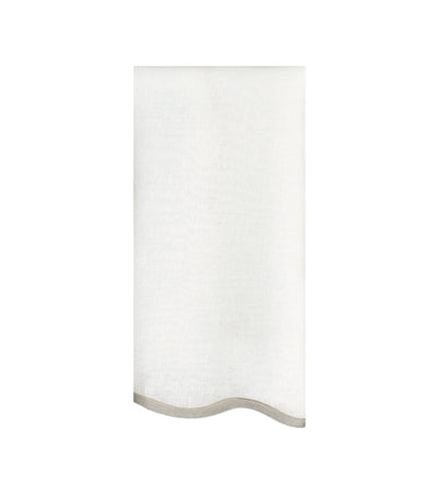 white linen napkin with light brown trim scalloped edge