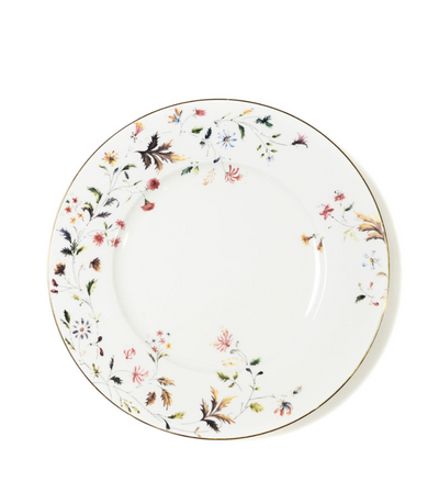 white charger plate with floral pattern in a versatile colour palette