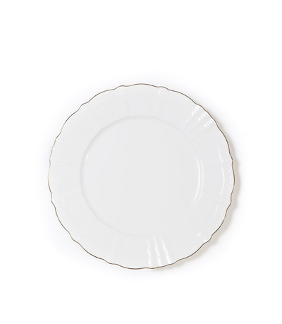 White porcelain salad plate with a scalloped edge and a thin gold rim