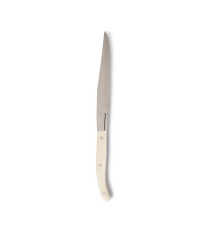 steak knife with ivory coloured handle
