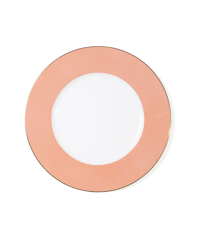 charger plate with peach rim and thin gold trim