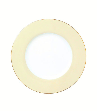 charger plate with light yellow rim and thin gold trim