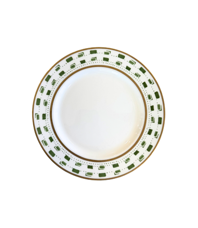 decorative dinner plate with green pattern and gold trim