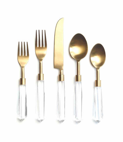 gold cutlery with a clear acrylic handle