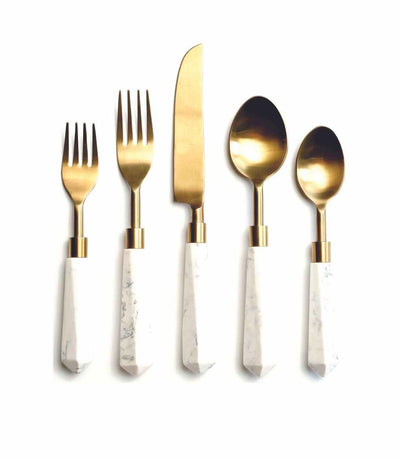 gold cutlery with a marble acrylic handle