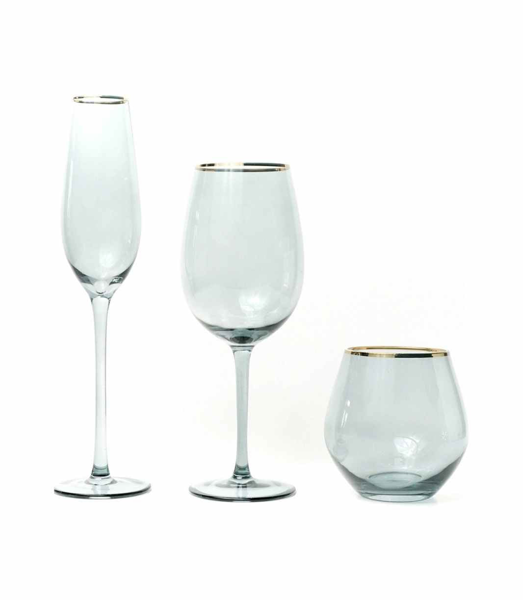 teal glassware with a gold rim