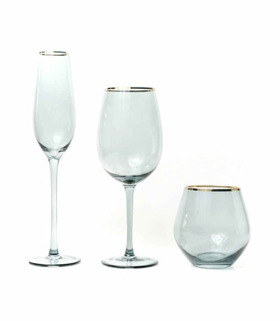 teal glassware with a gold rim
