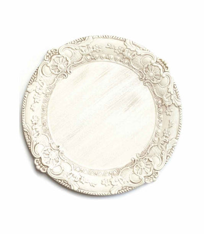 white ornate wooden charger plate