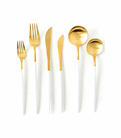 sleek gold cutlery with a white handle