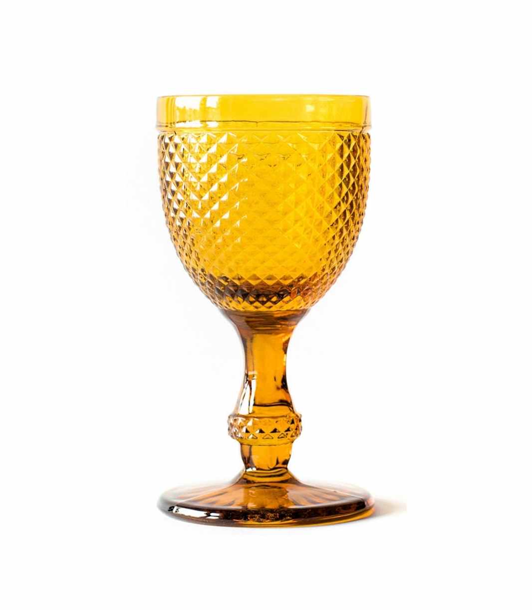 amber water goblet with textured surface