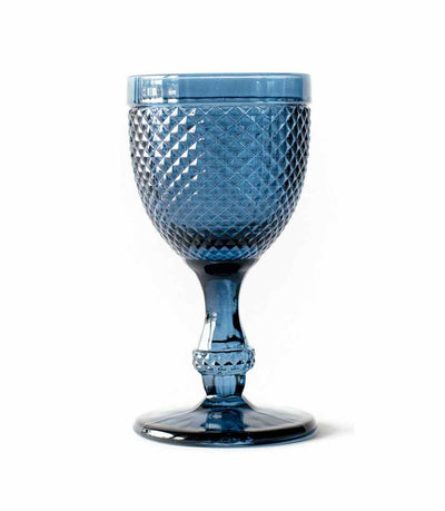 dark blue water goblet with textured surface