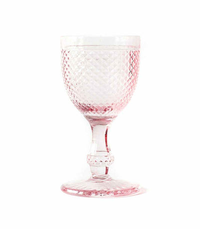 pink water goblet with textured surface