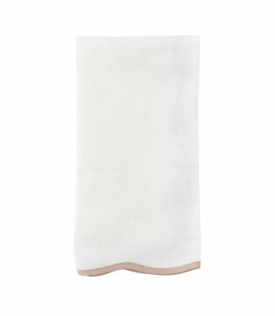 white linen napkin with nude trim scalloped edge 