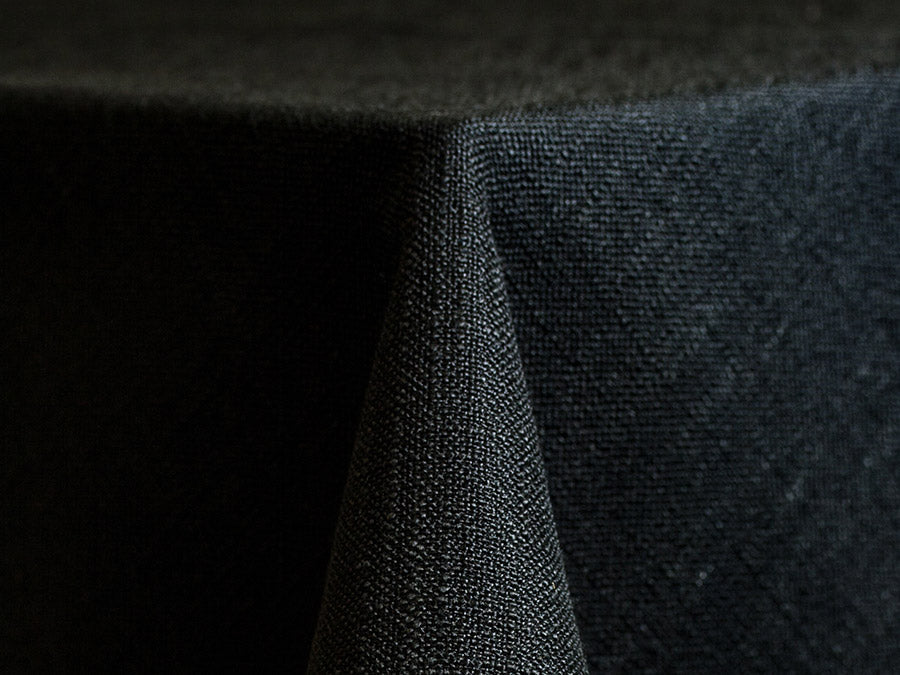 textured black tablecloth