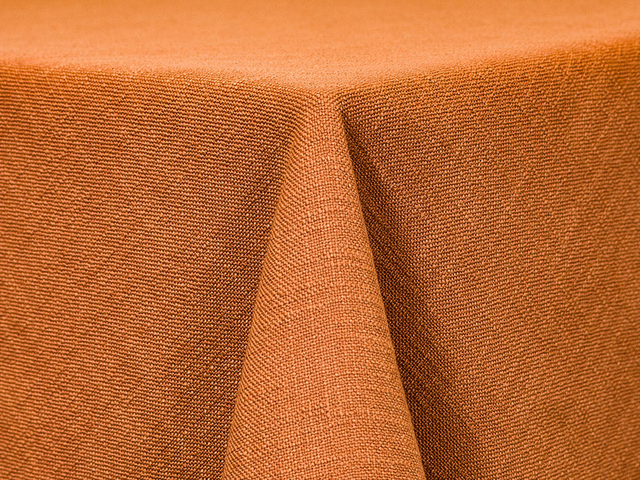 textured burnt orange tablecloth