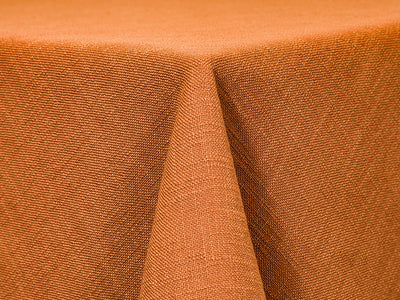 textured burnt orange tablecloth
