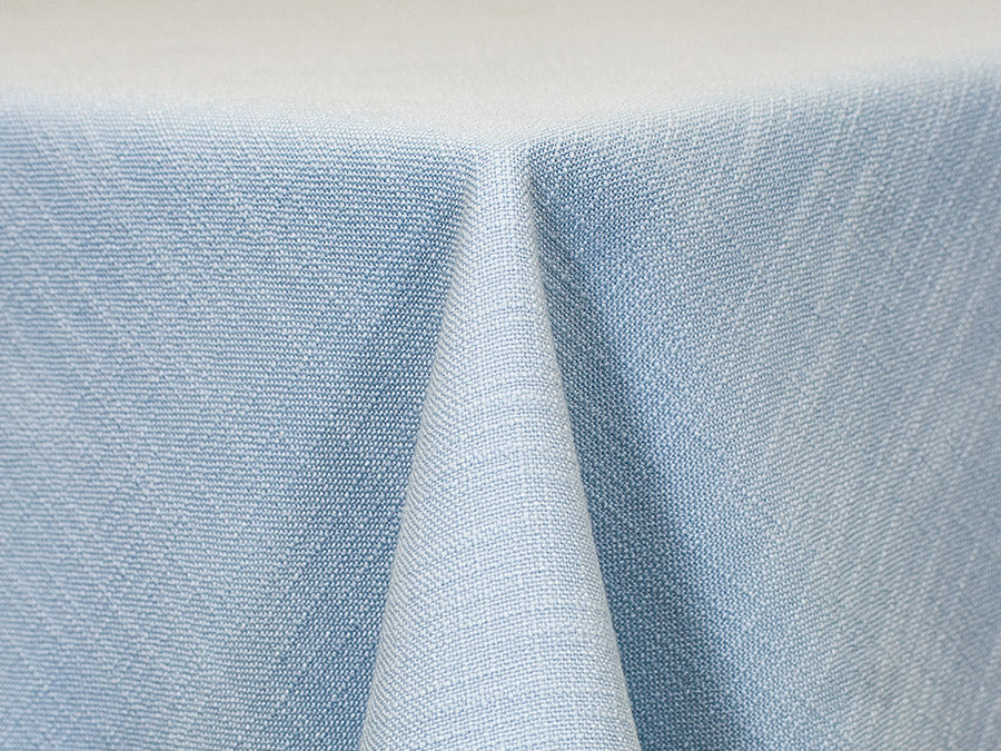 textured light blue tablecloth